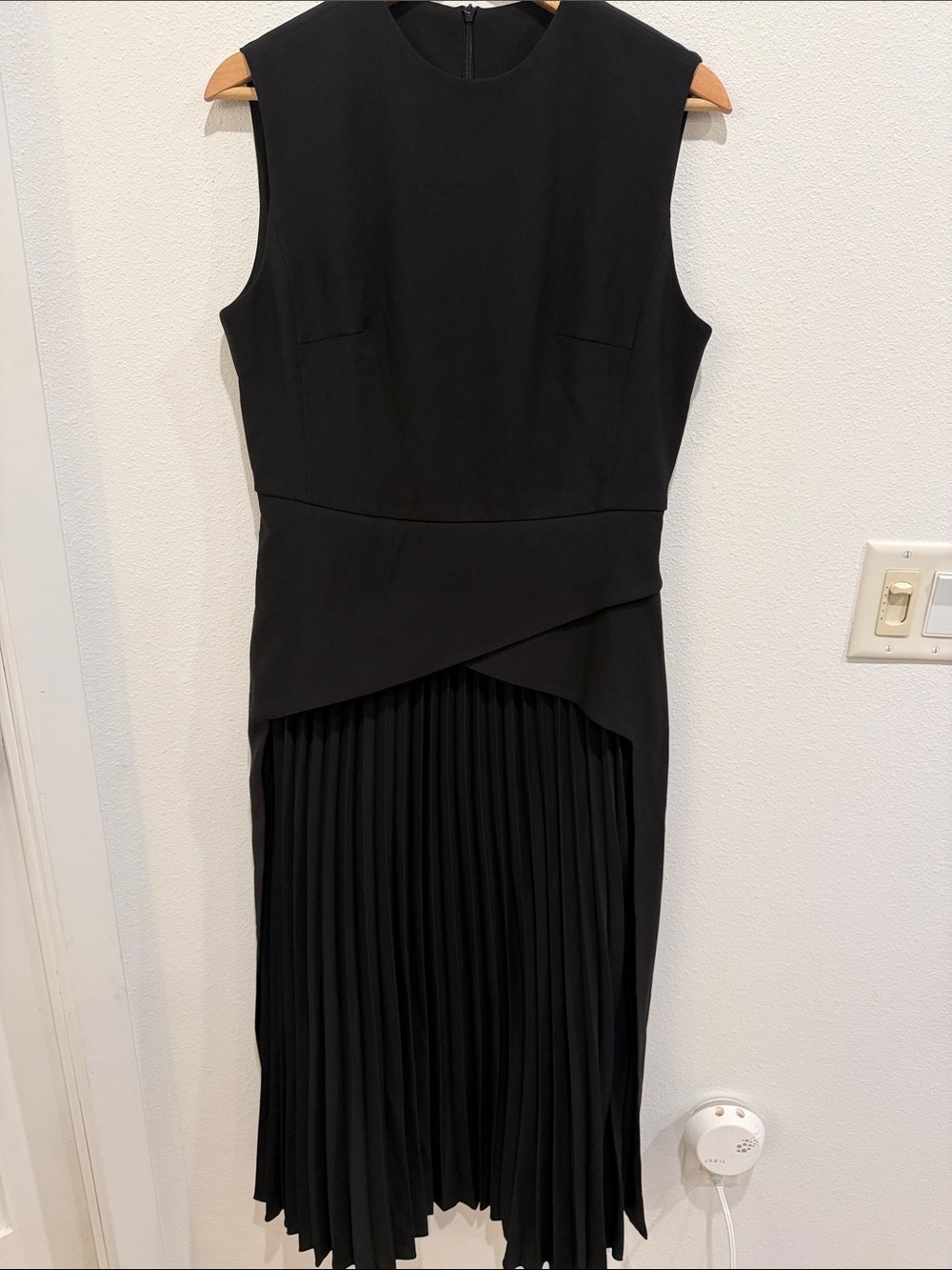 Commense Black Sleeveless Midi Dress with Asymmetrical Waist and Pleated Skirt